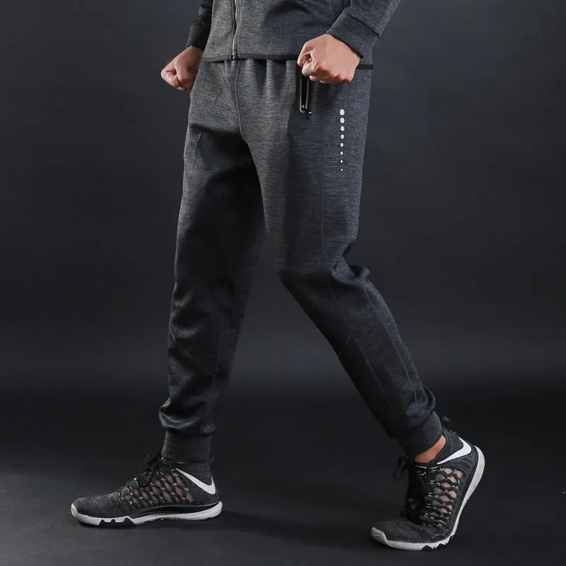 Grey and Royal Blue polyester fitness trousers with elastic waist for training and casual wear