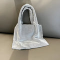 Silver cotton thread handbag with rhinestone detailing and open outer pocket