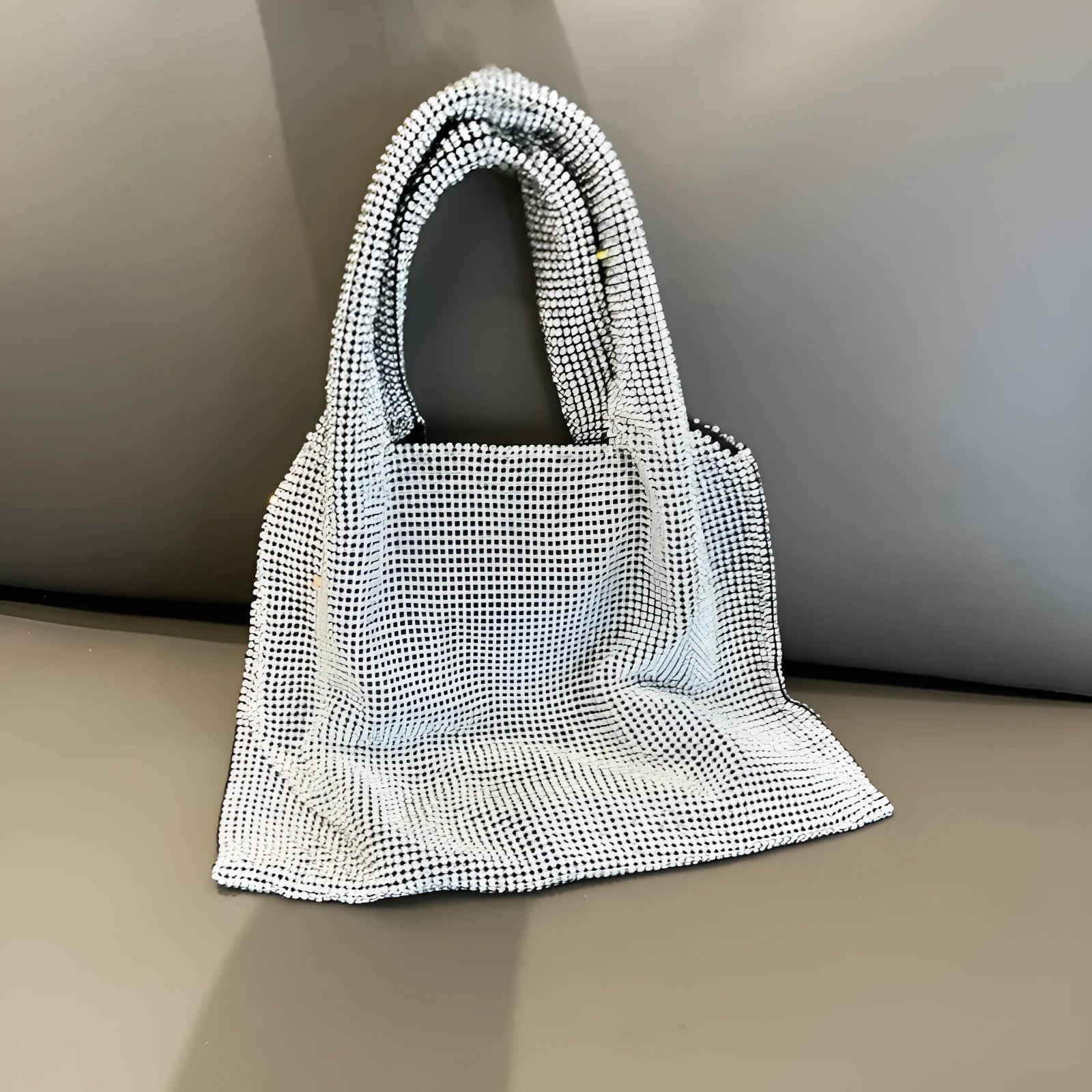 Silver cotton thread handbag with rhinestone detailing and open outer pocket