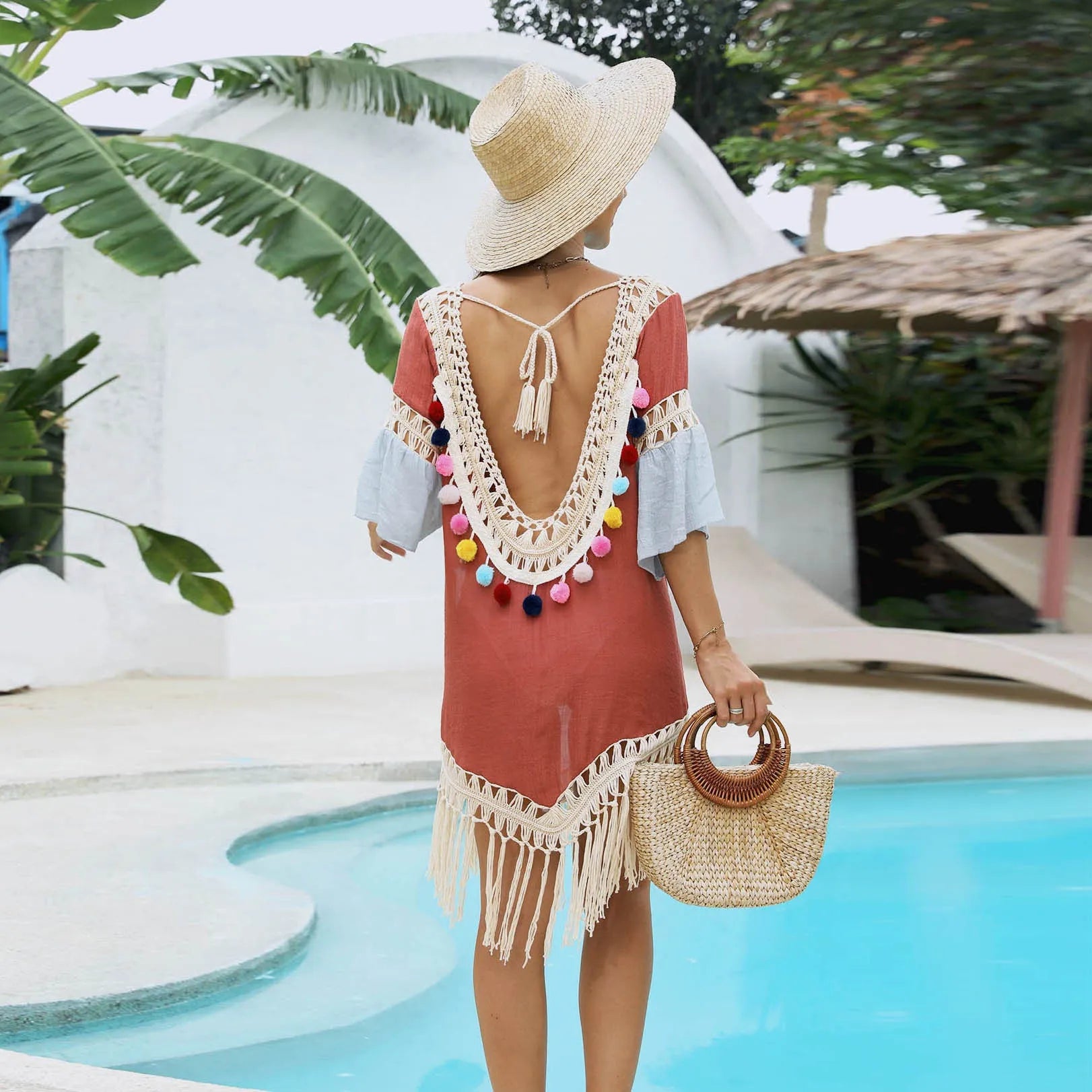 Orange floral beach overskirt with hand-crochet stitching and tassel detailing