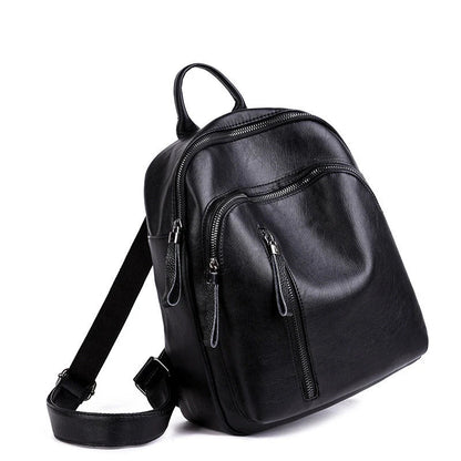 Stylish PU backpack in black, red, and blue colours with a sleek, square silhouette and multiple interior compartments