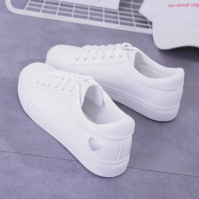 Women's PU leather heart pattern flat shoes in white red colour with non-slip rubber sole