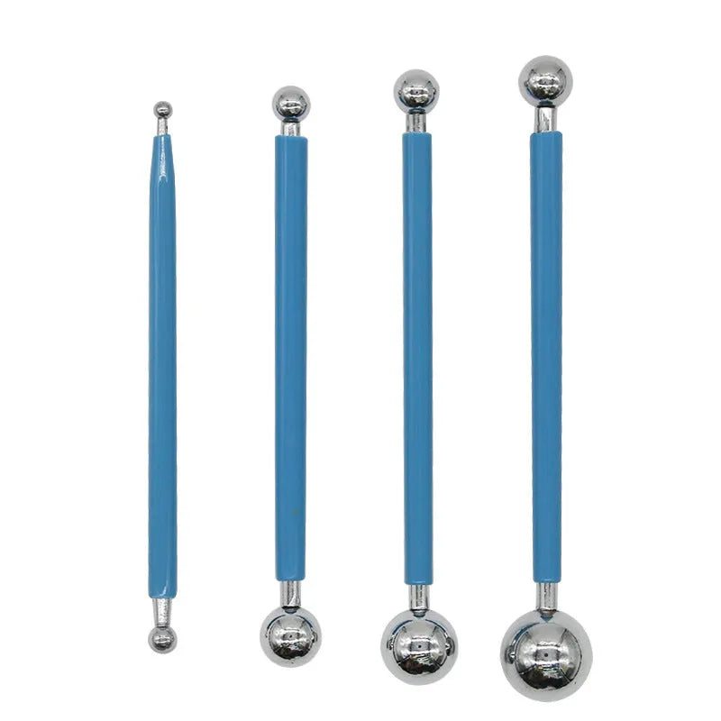 Pottery tool set containing acrylic ribs, stainless steel wire tools, and plastic sculpting tools inside a blue pen bag.