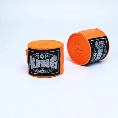 Two 5-metre boxing hand wraps in different colours showing elastic cotton construction