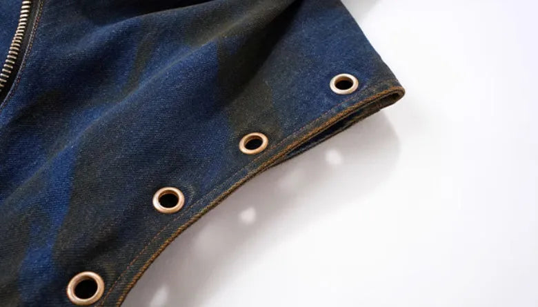 Blue heavy industry style hooded denim vest and matching trousers laid flat