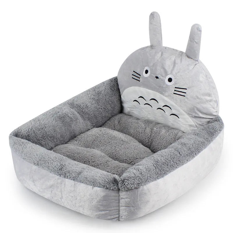 Warm plush pet kennel mat with dog head style, small size 40x50cm, on a wooden floor