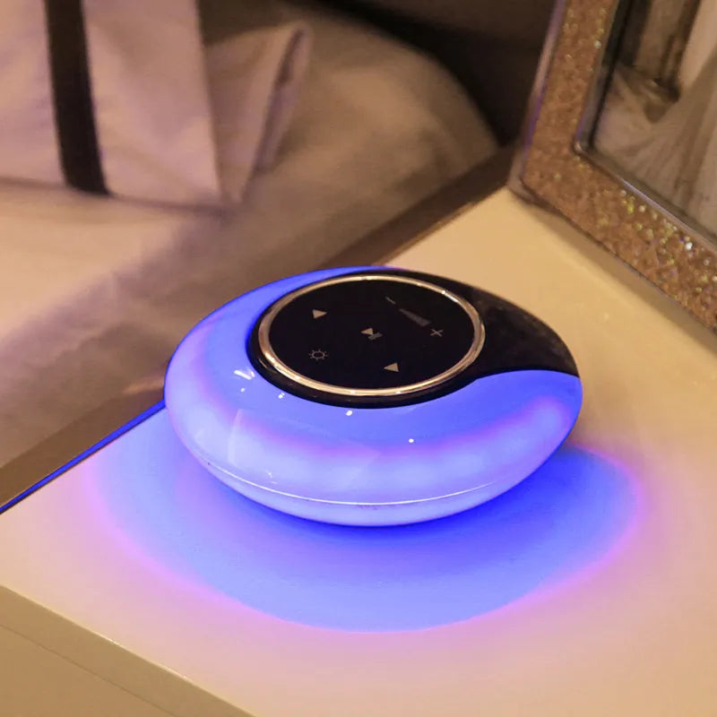 DEAMAK-1 Bluetooth speaker and LED desk lamp in folded position showing touch controls.