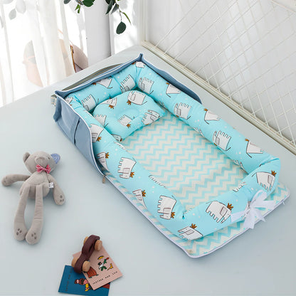 Foldable cotton portable baby crib in Animal World Blue, 90x50 cm with pillow and strap, weighing 1.3 kg