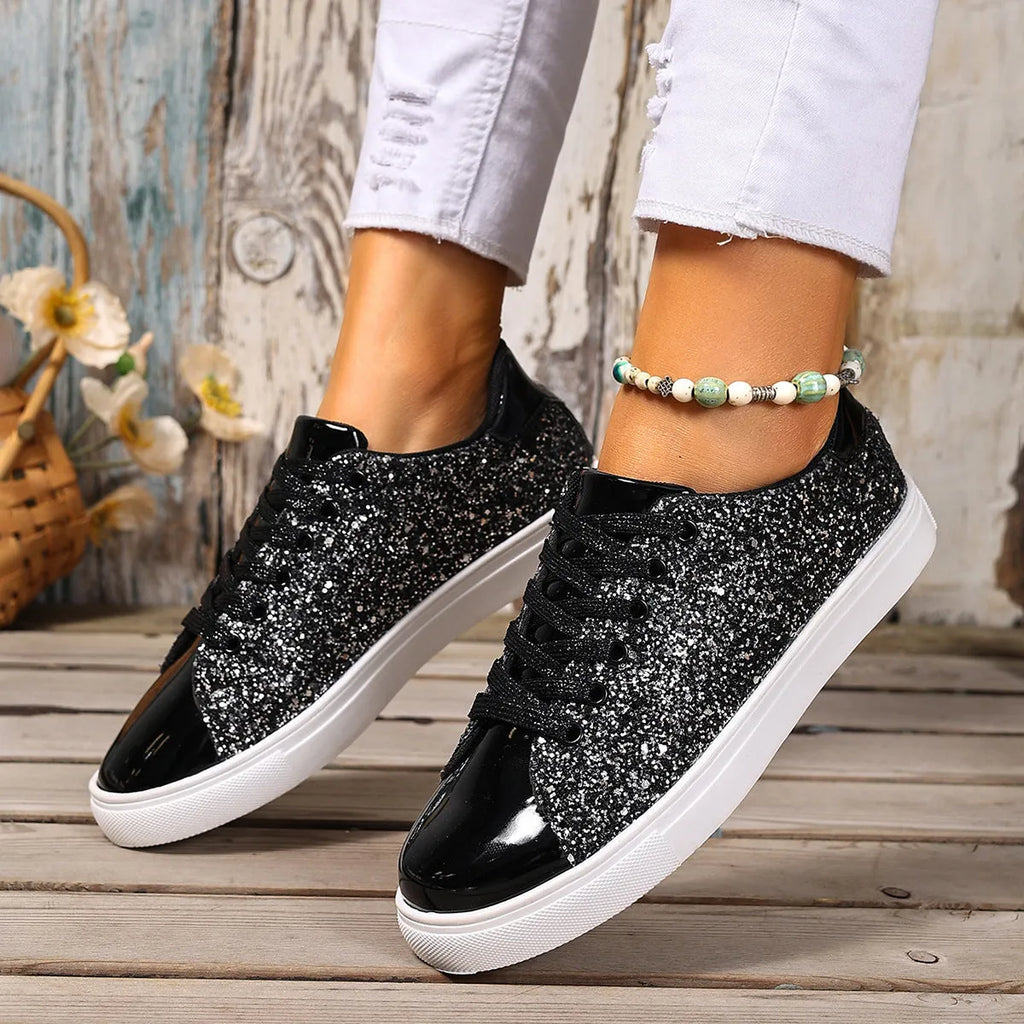 Women's plus size black sequined lace-up board shoes with a flat heel and round toe on a white background