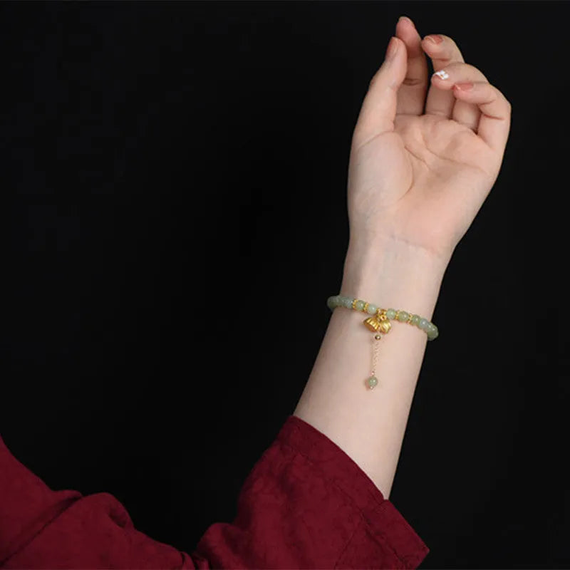 Hetian Jade bracelet with Step by Step Lotus design and Fu character on 6mm beads