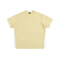 Loose waffle-knit short-sleeved t-shirt with retro alphabet embroidery on the front, shown in navy blue.