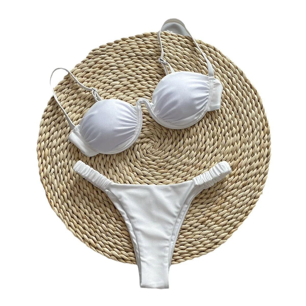 Women's black underwire bikini top and briefs set made from high elasticity nylon fabric.