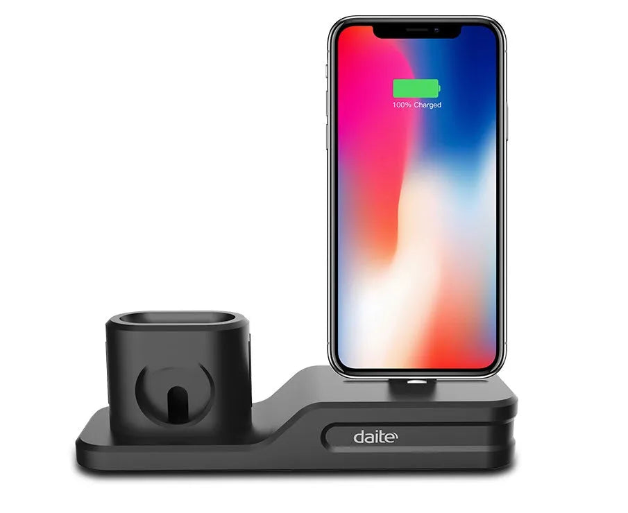 Black geometric 3-in-1 charging stand for Apple iPhone, Watch, and AirPods on a desk.