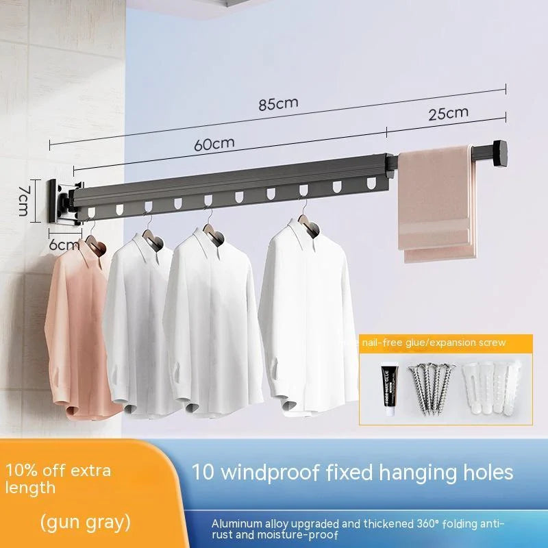 Aluminum retractable clothes drying rack mounted on wall with suction cups