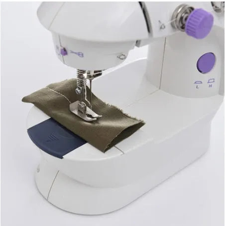Mini electric household sewing machine with lighting and thread cutter measuring 20x15x10cm