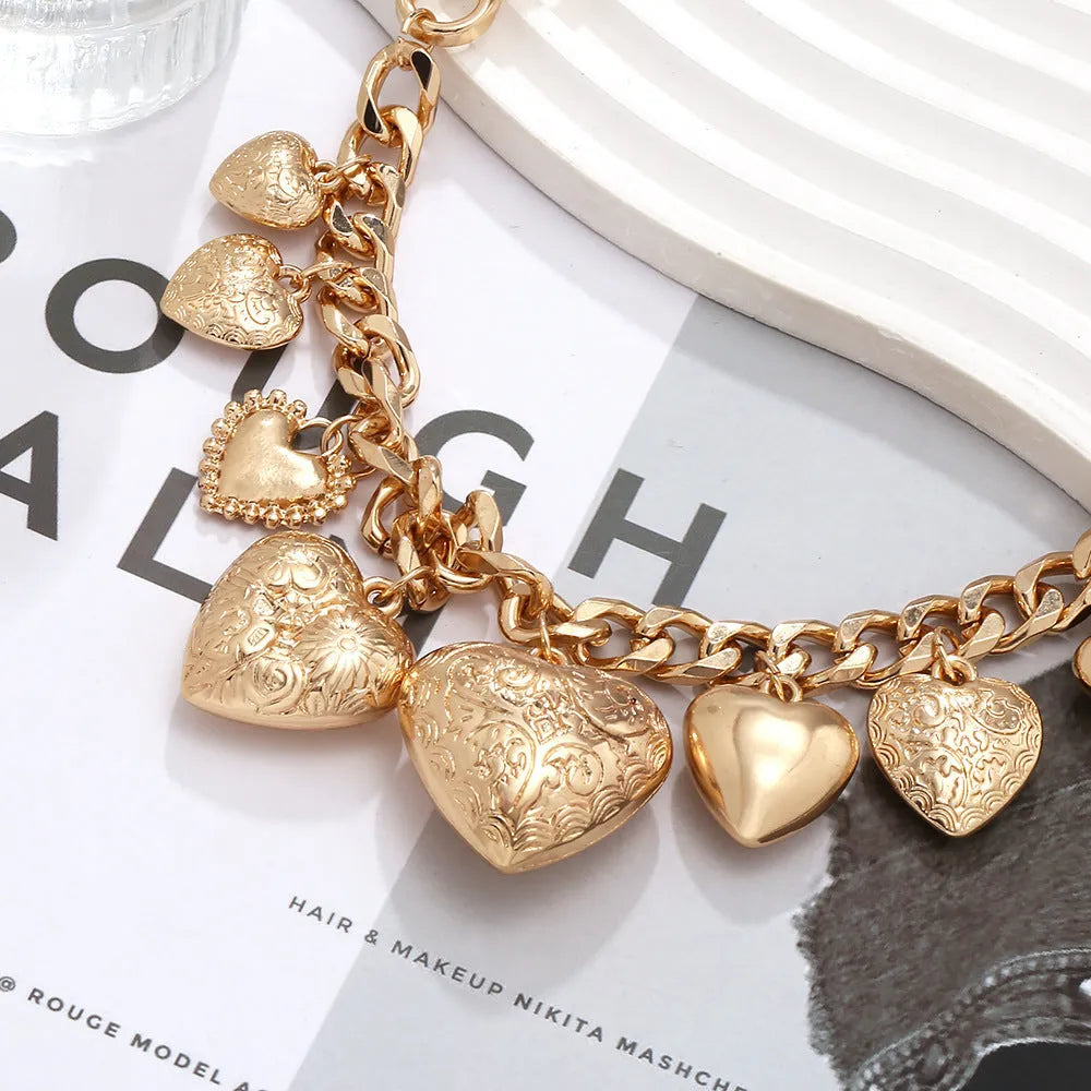Carved heart pendant necklace with adjustable chain in exaggerated luxury style