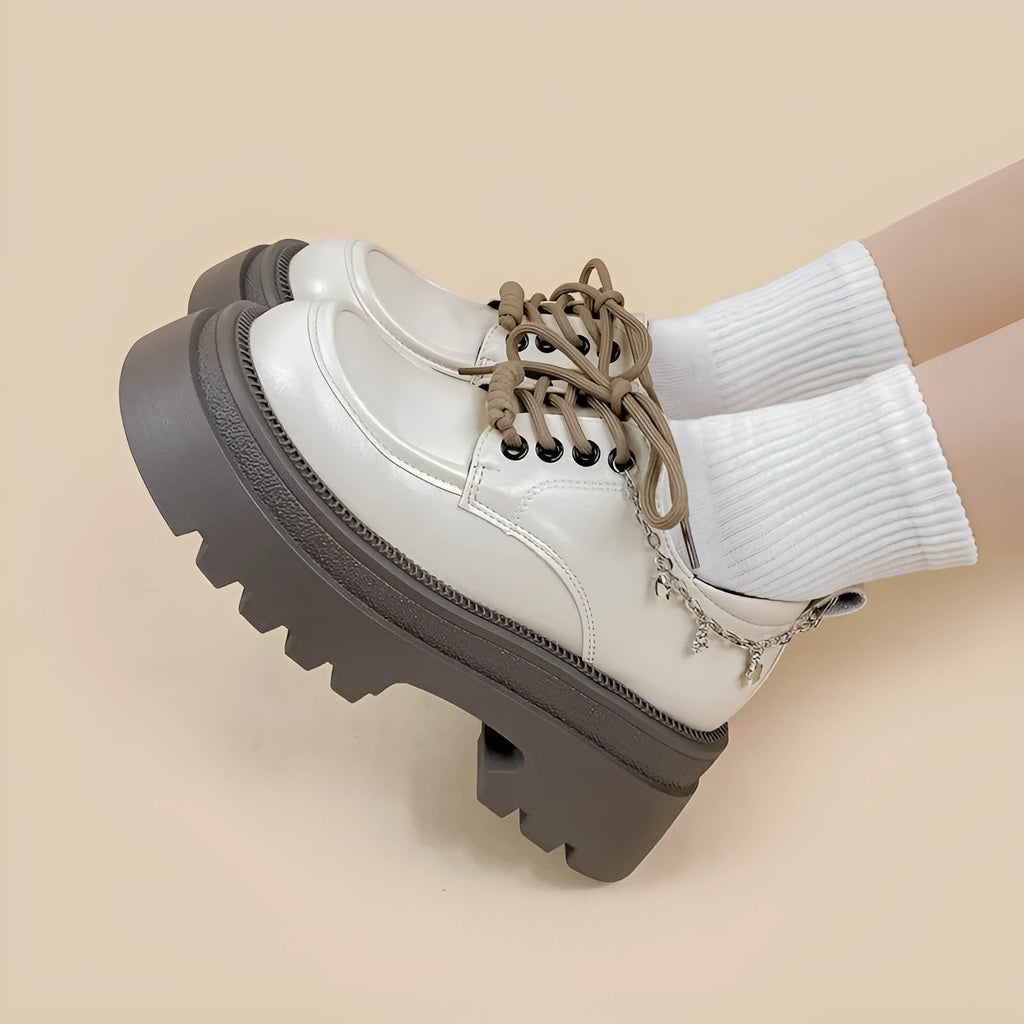 White XINGX Bear colour platform Mary Jane shoes with thick chunky heel and front lace-up.