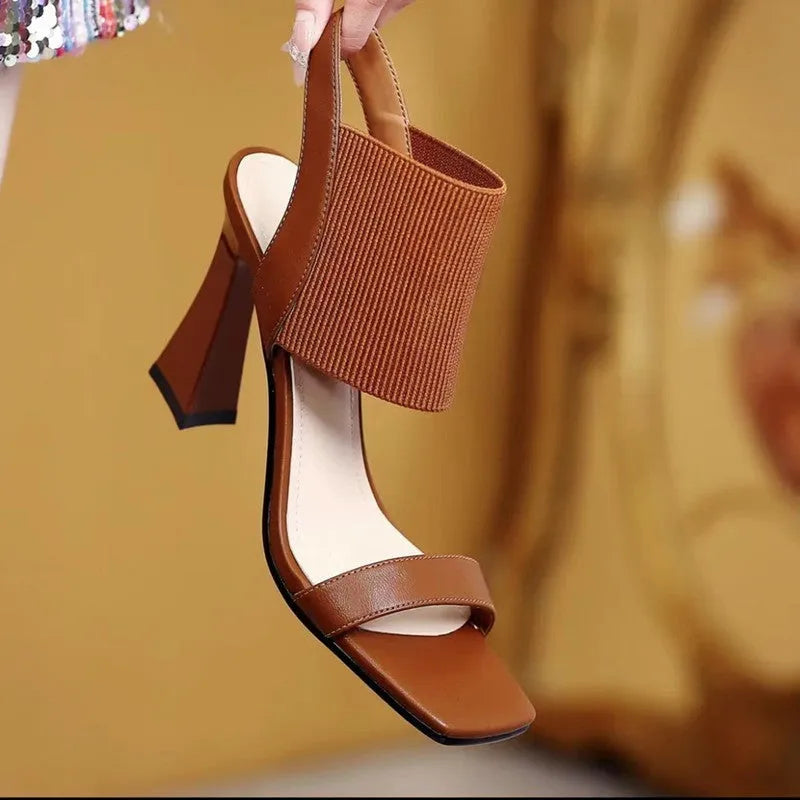 Women's black high heel sandals with elastic straps, PU leather uppers and rubber soles