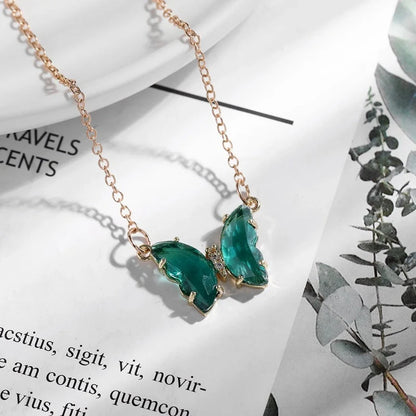 Glass Crystal Butterfly Necklace with adjustable water wave chain in blue, purple, light blue, and pink