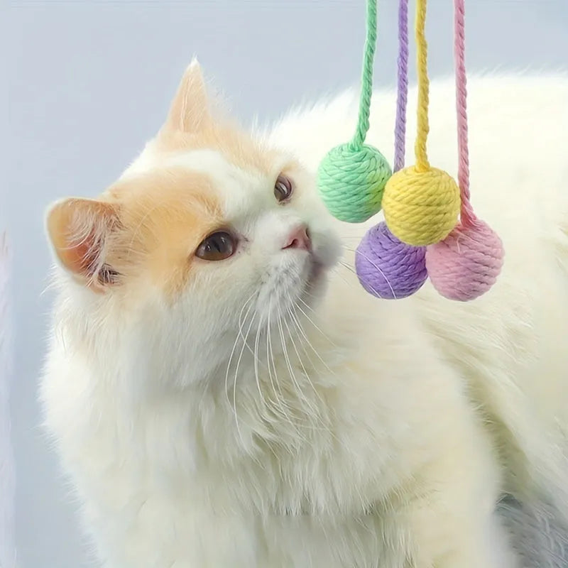 Coloured cat toy ball with rope handle and internal bell in 6cm or 3cm sizes