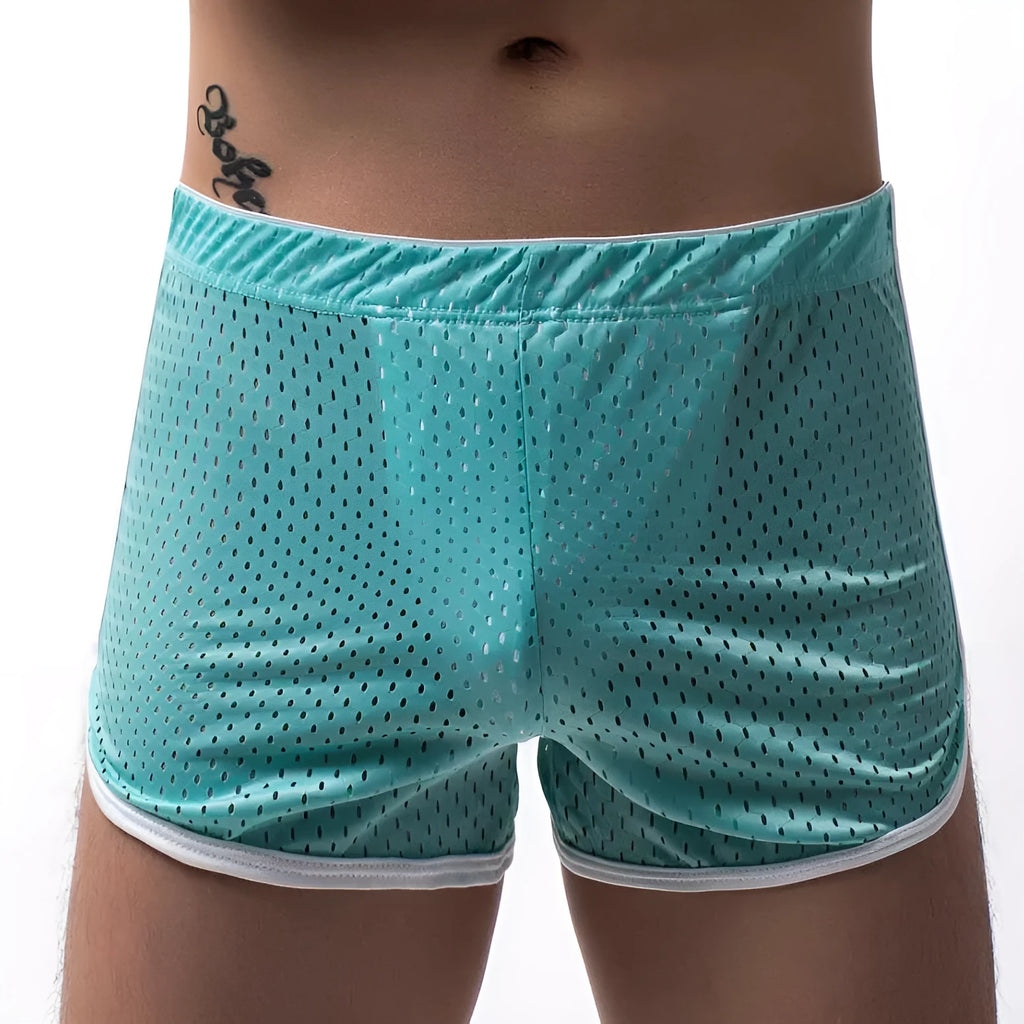 Men's cotton blend boxer shorts in black, showing mid waist and breathable knit fabric.