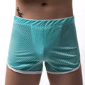 Men's cotton blend boxer shorts in black, showing mid waist and breathable knit fabric.