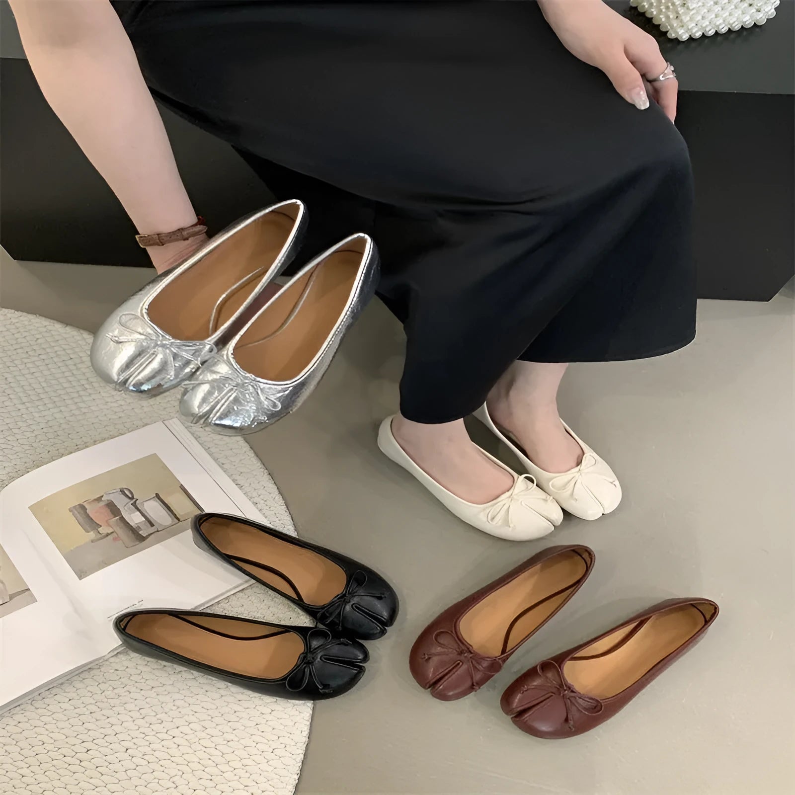 Women's split-toe flats in beige colour showing round toe design and slip-on style with shallow vamp cut