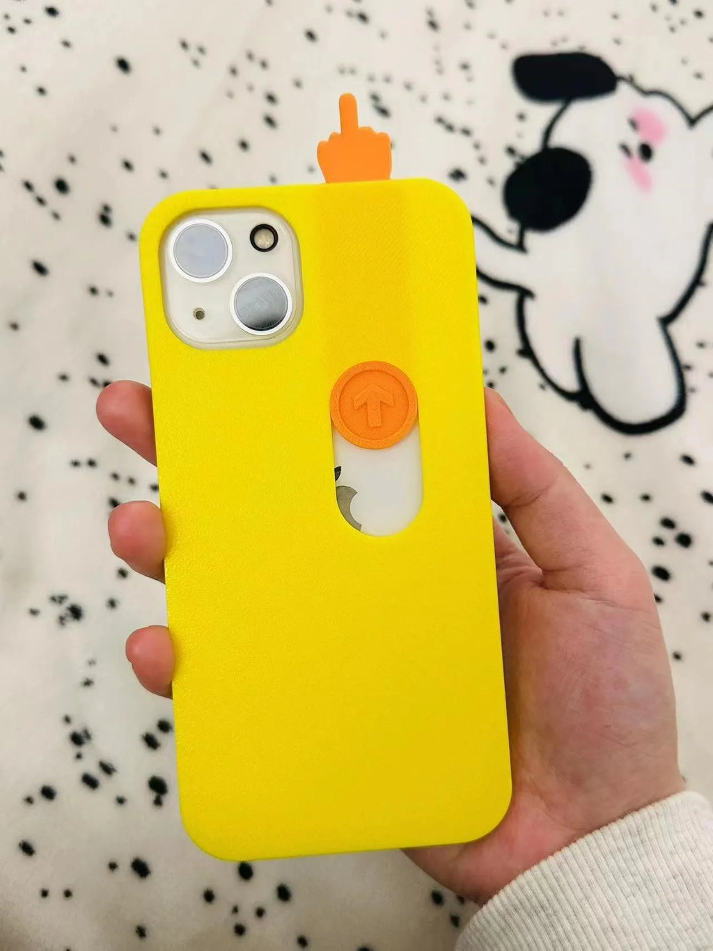 3D printed sliding middle finger phone case in bright yellow for iPhone 15 Pro Max with fall protection