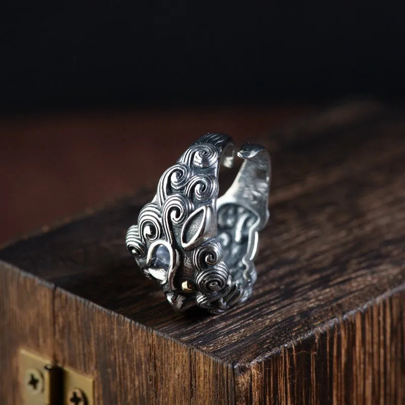 Silver open-style diamond ring with jibeast animal zodiac pattern and retro design details