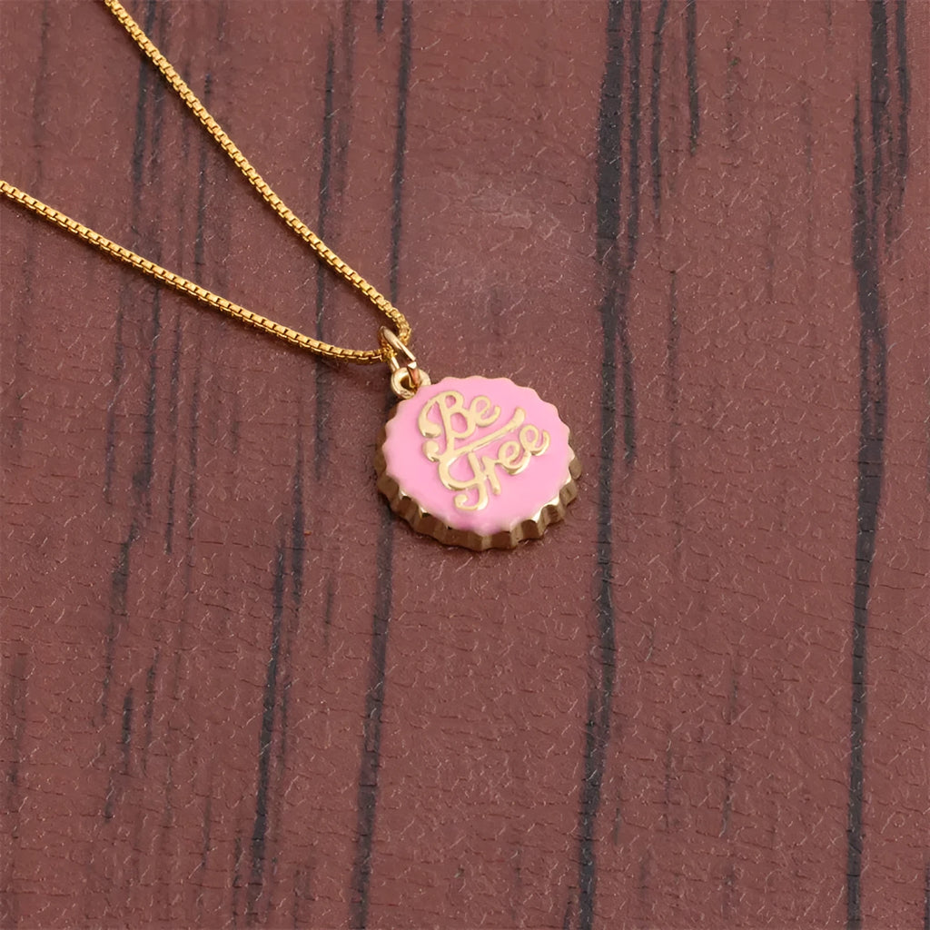 Copper Be Free bottle cap pendant necklace on a 40cm box chain with gold electroplating.