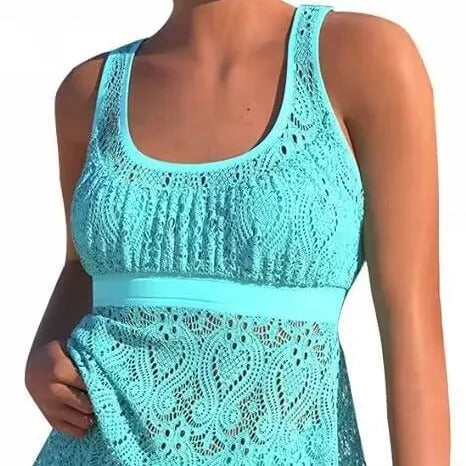 Women's two-piece swimwear set in hollow conservative split style with sleeveless briefs and solid colour.