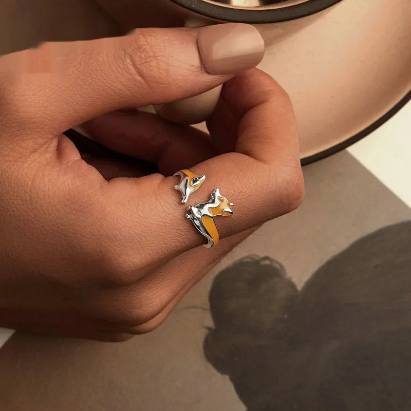 Cartoon corgi dog design on a silver plated women's ring.
