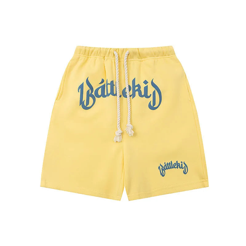 Cotton-blend loose-fit street shorts in black, shown in a casual setting.