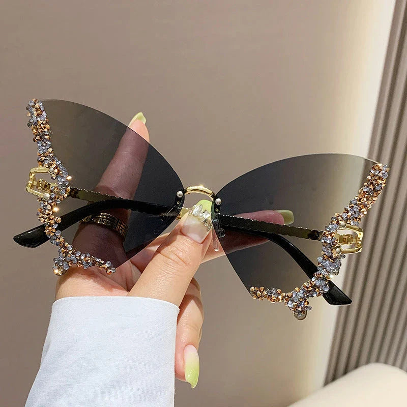Luxury diamond-studded butterfly sunglasses in various gradient color options, featuring a vintage-inspired design and high-quality materials for a fashionable and glamorous look.