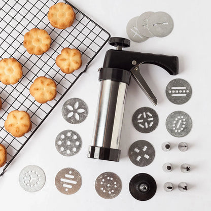 Stainless steel biscuit press with 13 moulds and 8 nozzles for baking and decorating