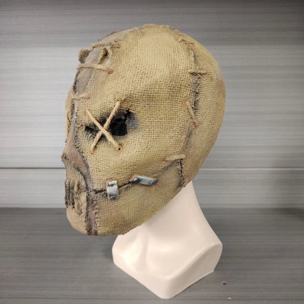 Latex Halloween horror mask with scar skull design showing dimensions of 31cm height