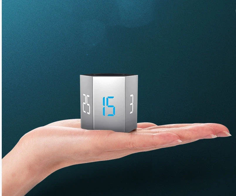 A sleek, modern digital kitchen timer with a large display and adjustable volume settings