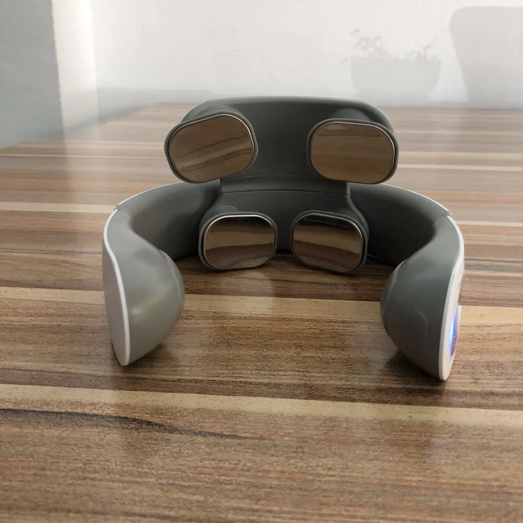 White shoulder neck massager with four mechanical heads for domestic use