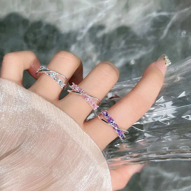 Copper geometric star river track ring with inlaid zircon stones in blue diamond colour, open style on hand