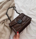 Small rivet chain crossbody bag for women, faux leather, adjustable strap, metal hardware, black brown coffee red