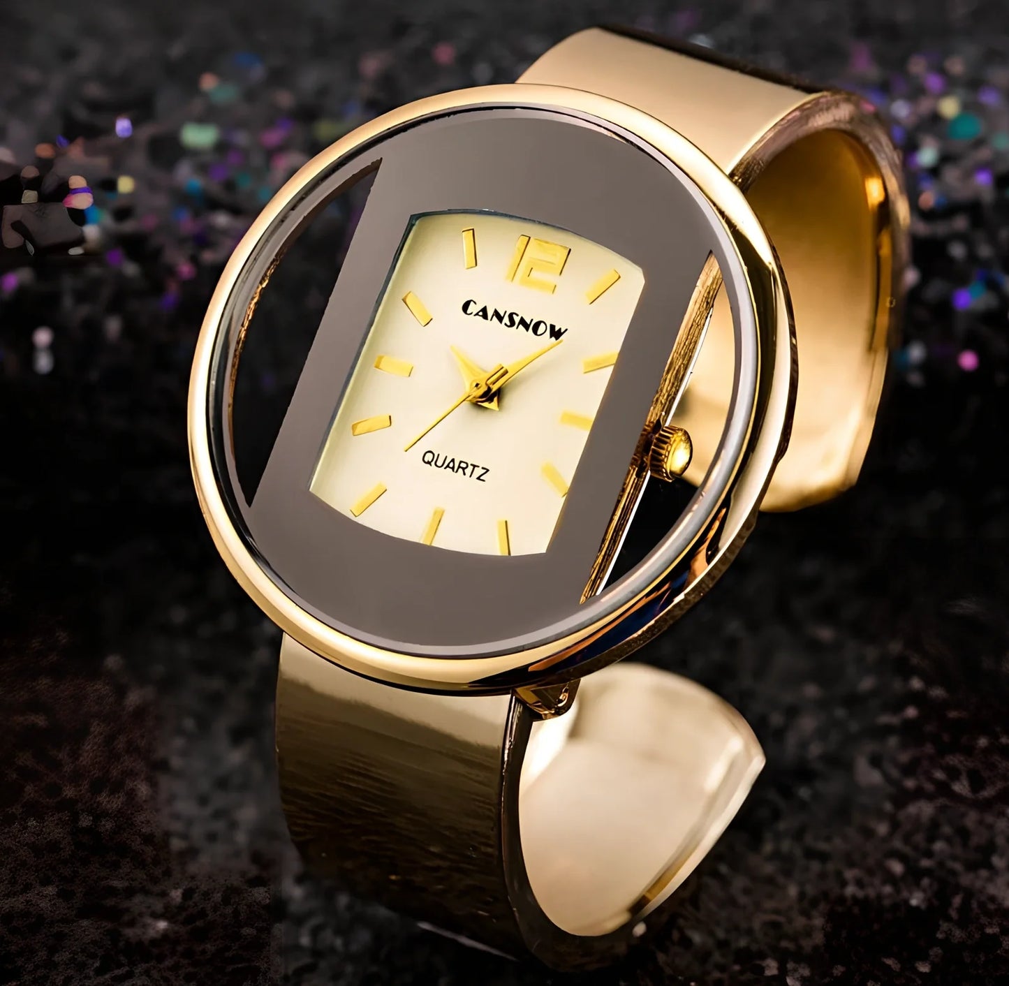 Women's gold black quartz cuff watch with 40mm dial, adjustable steel band 18mm wide, precise movement and water resistant