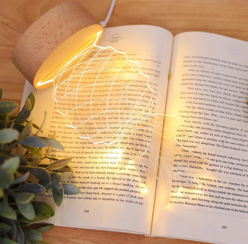 Cartoon pineapple-shaped USB table lamp with wooden base on a bedside table.