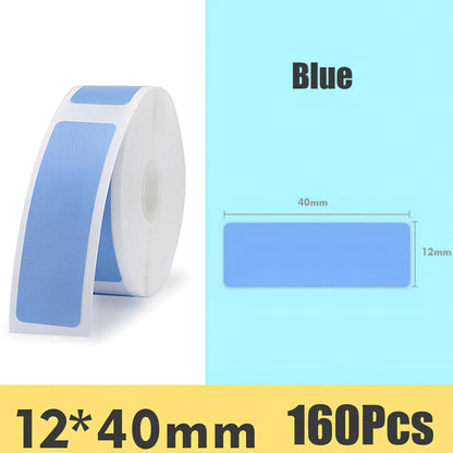 Pack of white D11 waterproof thermal label paper, 12x40mm size, showing clear printed text on resistant surface