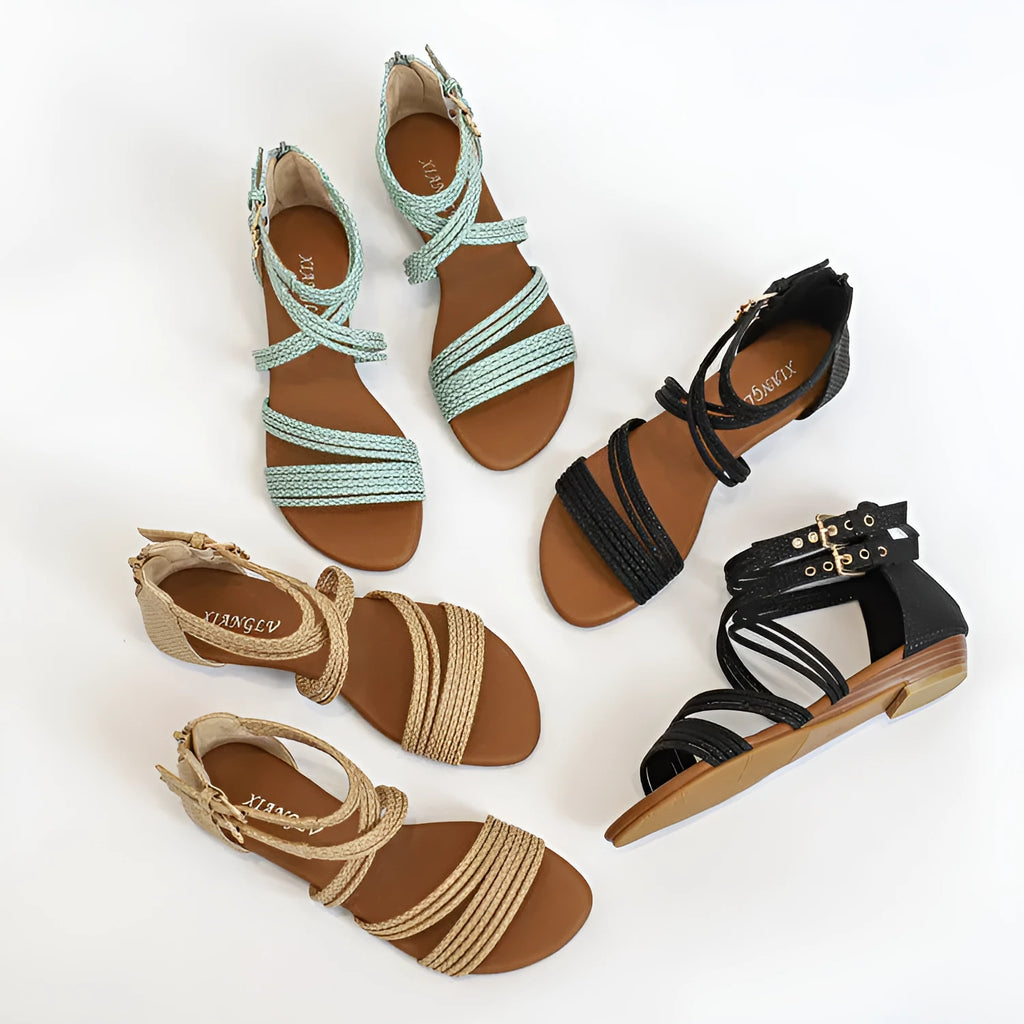 Women's open-toe Roman sandals with cross straps, a back zipper, and a wedge rubber sole.