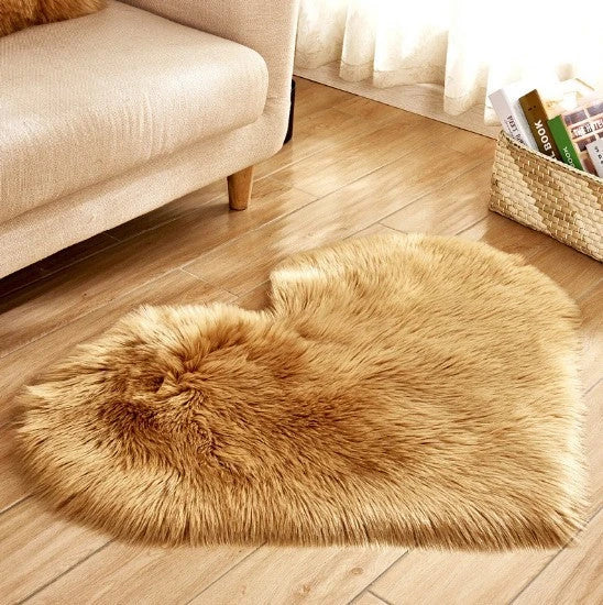 Soft, plush heart-shaped rug in various colors and sizes for comfortable home decor