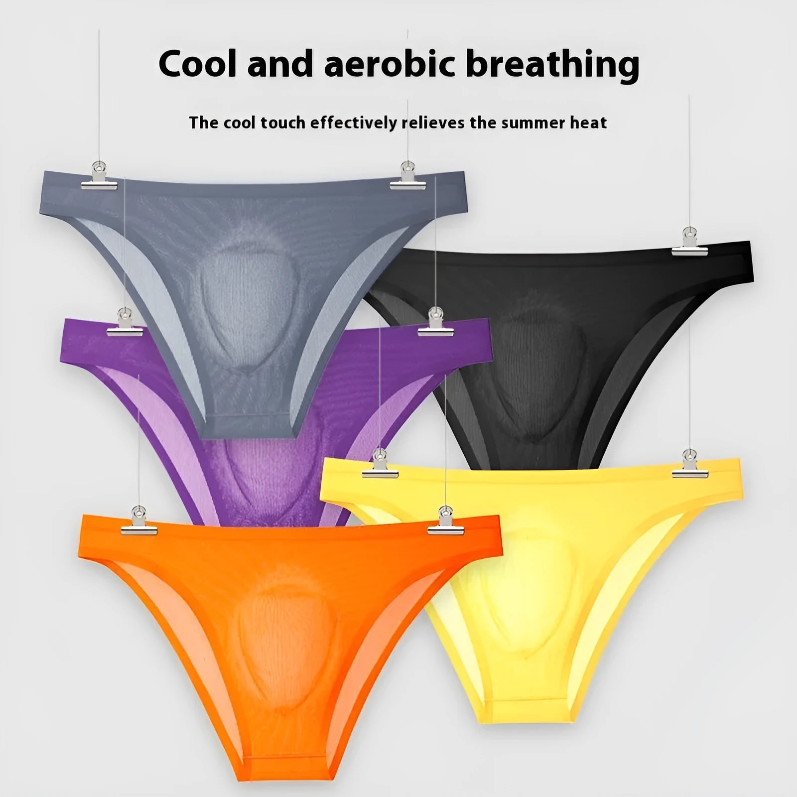 Seamless ice silk low waist briefs in black, shown flat to highlight invisible design.