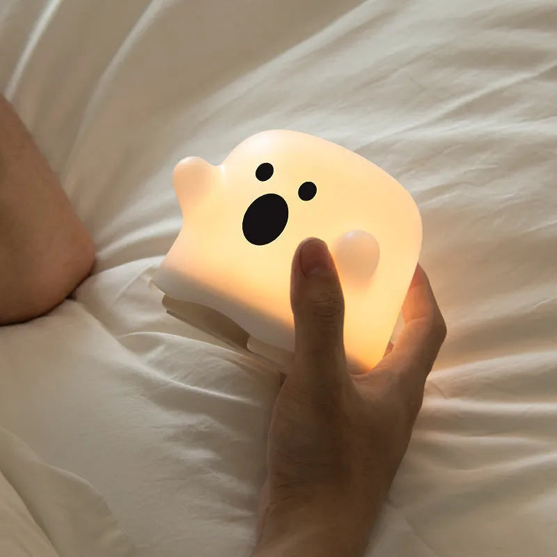 Silicone touch sensor night light showing soft glow illumination and compact design