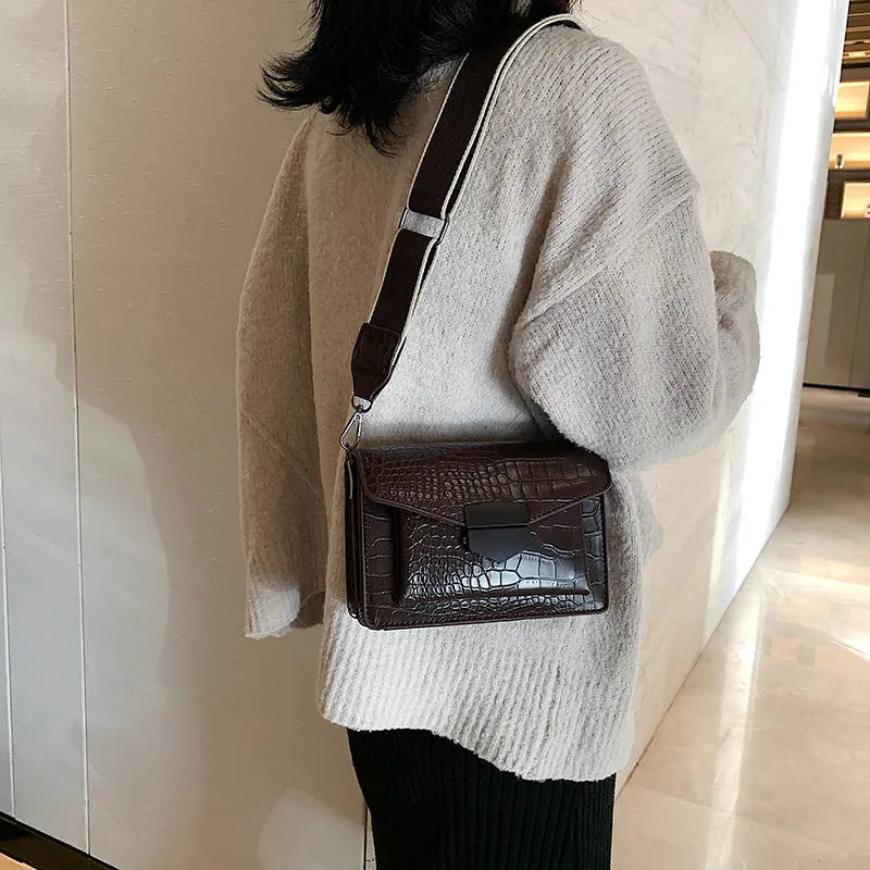 Vintage style PU crossbody bag in black, shown with dimensions for mobile phones and wallets