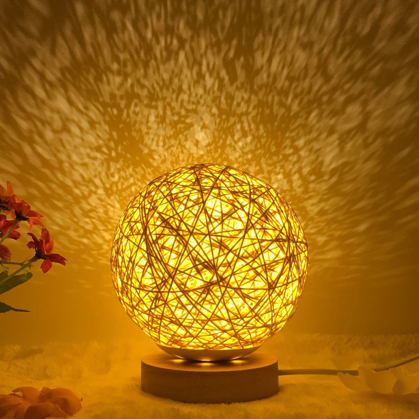LED rattan table lamp with hand-knit lampshade in various colours