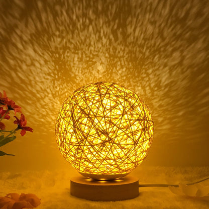 LED rattan table lamp with hand-knit lampshade in various colours